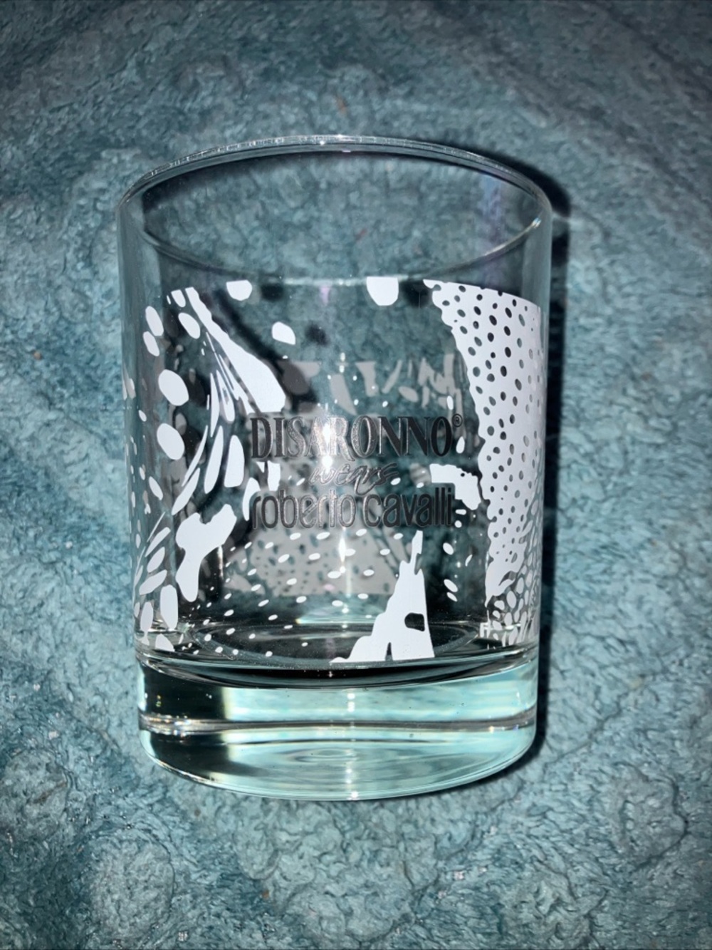 Disaronno wears Roberto Cavalli Printed Rocks Glass - Clear with White Design